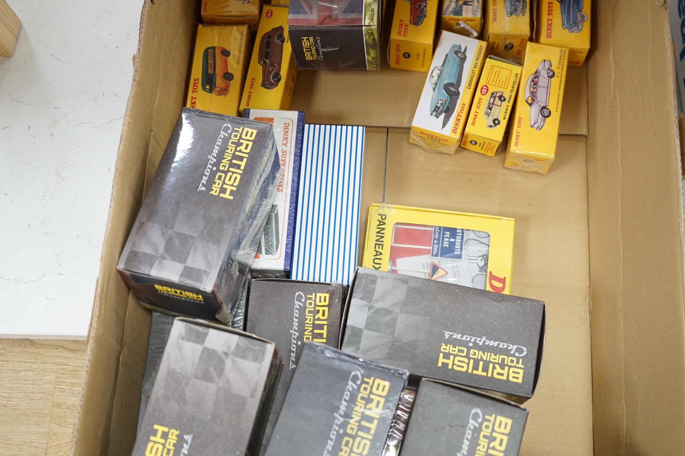 Thirty boxed diecast vehicles including; sixteen Atlas Dinky Toys and thirteen Atlas Editions British Touring Car Champions series